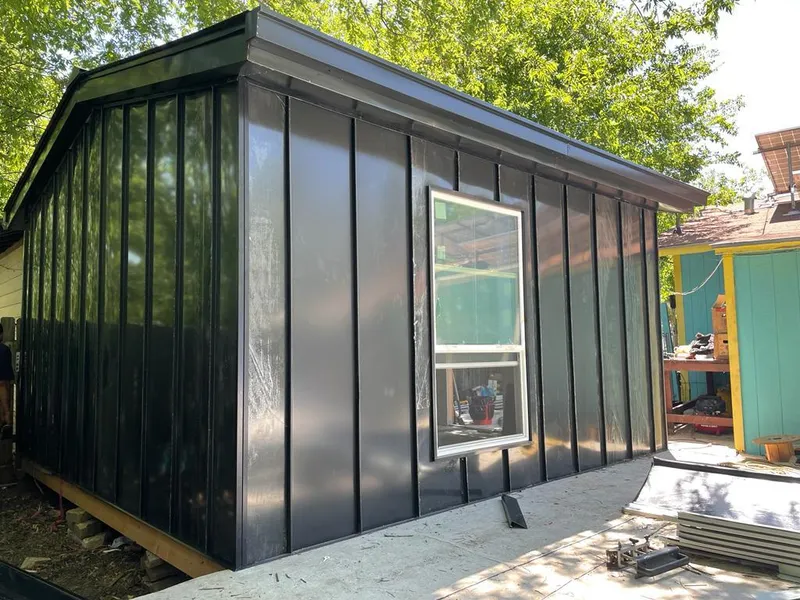 Black standing seam metal wall panels for Roof Inspection in Sedro-Woolley