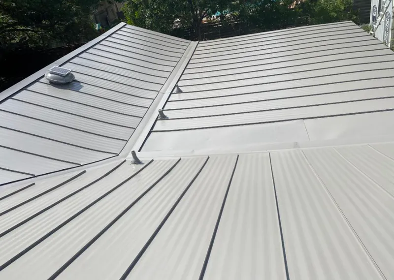 Solar attic fan installed on a metal roof for Roof Ventilation in Sedro-Woolley